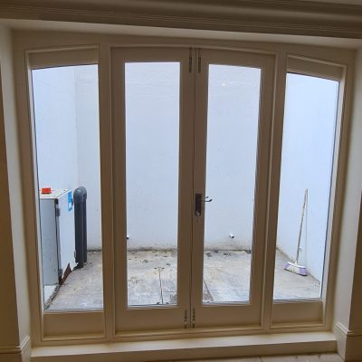 Bi-folding door