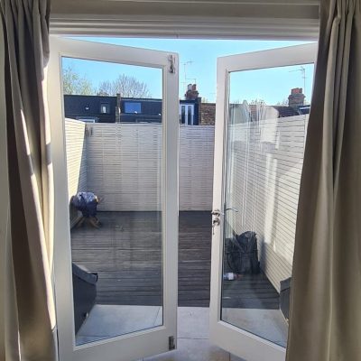 Elegant timber French doors handcrafted by 4 Seasons Joinery.