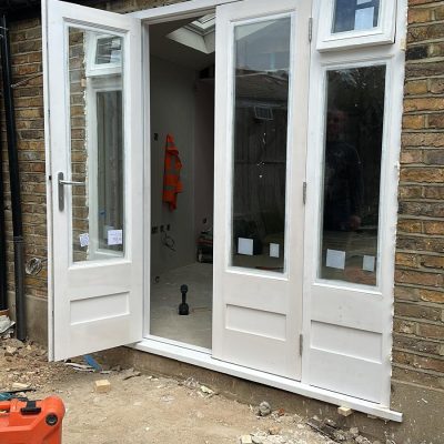 Traditional Wooden Back Door Fitted by 4Seasons Joinery